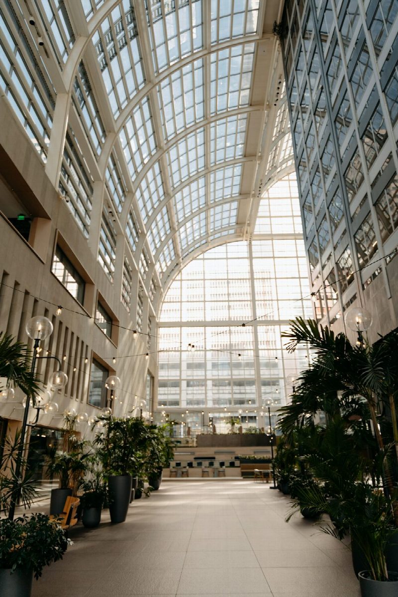 The bright, open atrium lobby of a modern multispecialty hospital
