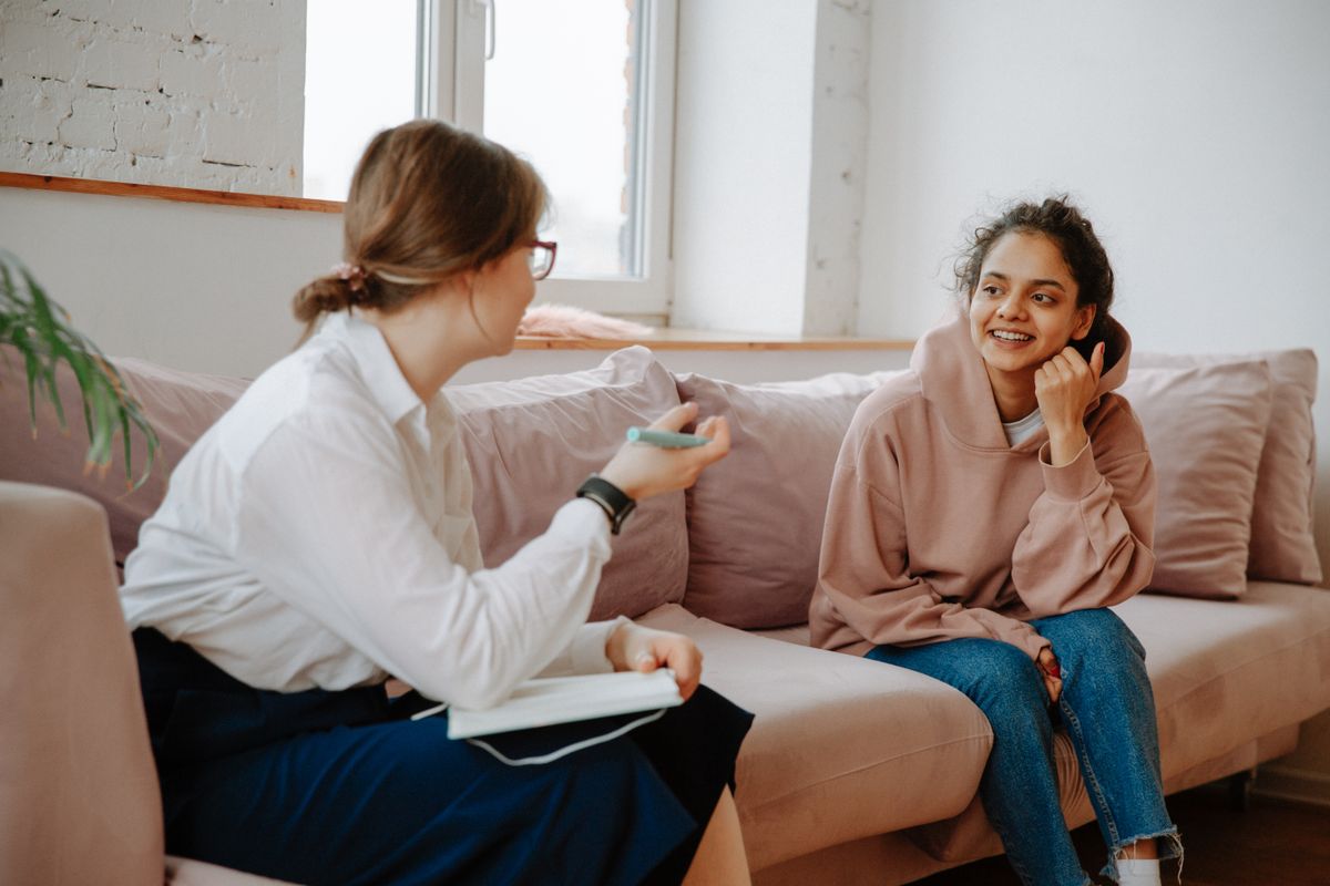 A therapist and client noticing patterns together